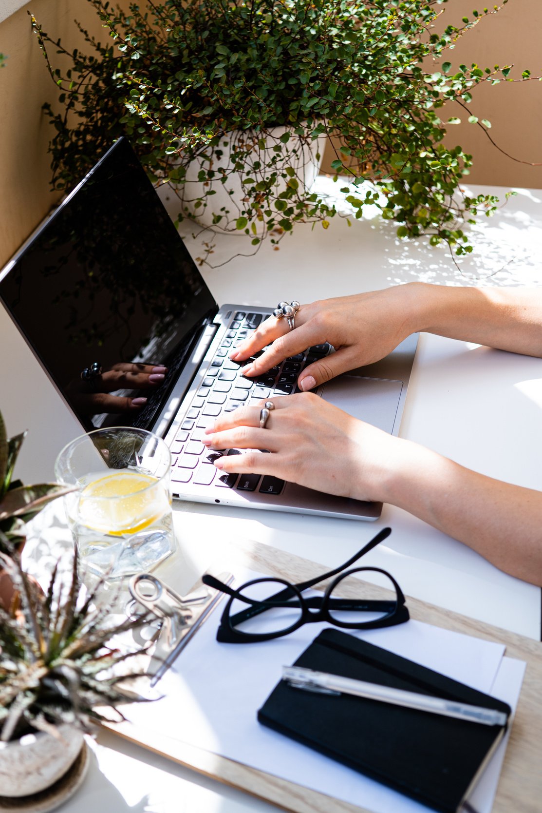 Woman’s Hands on a Laptop on an Desk